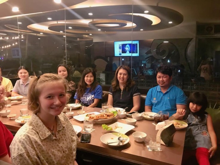 My host family and I at dinner with my teachers.